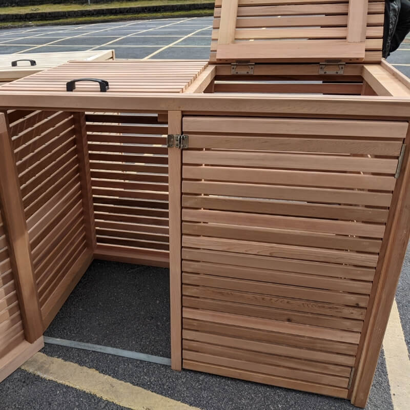 Our slatted cedar bin stores come with a roof hatch for easy access