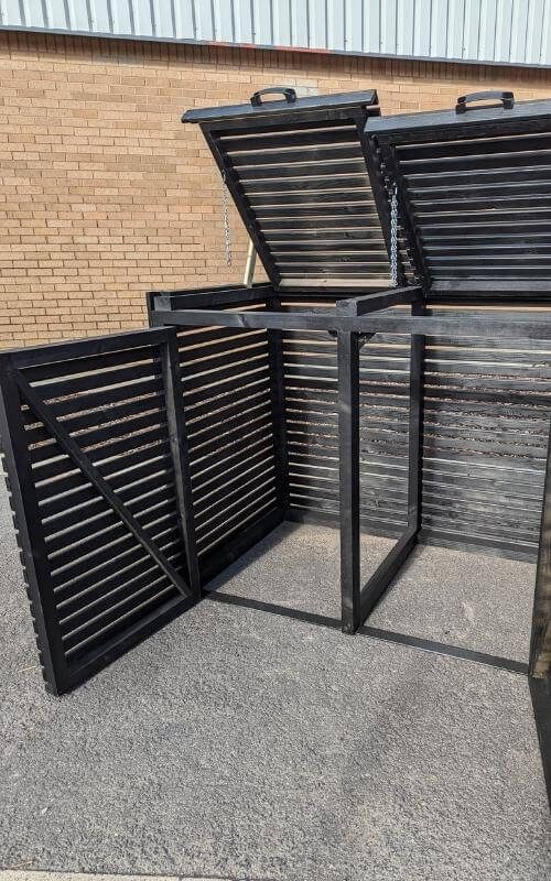 Our staining services have transformed this standard pressure-treated bin store.