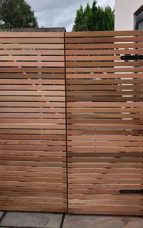This slatted side gate uses our range of 44mm western red cedar slats